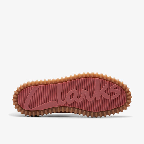 Sole of a shoe with a wavy edge, pink center with "Clarks" embossed.
