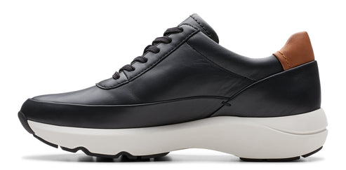 A black leather sneaker with brown heel accent and a white sole.