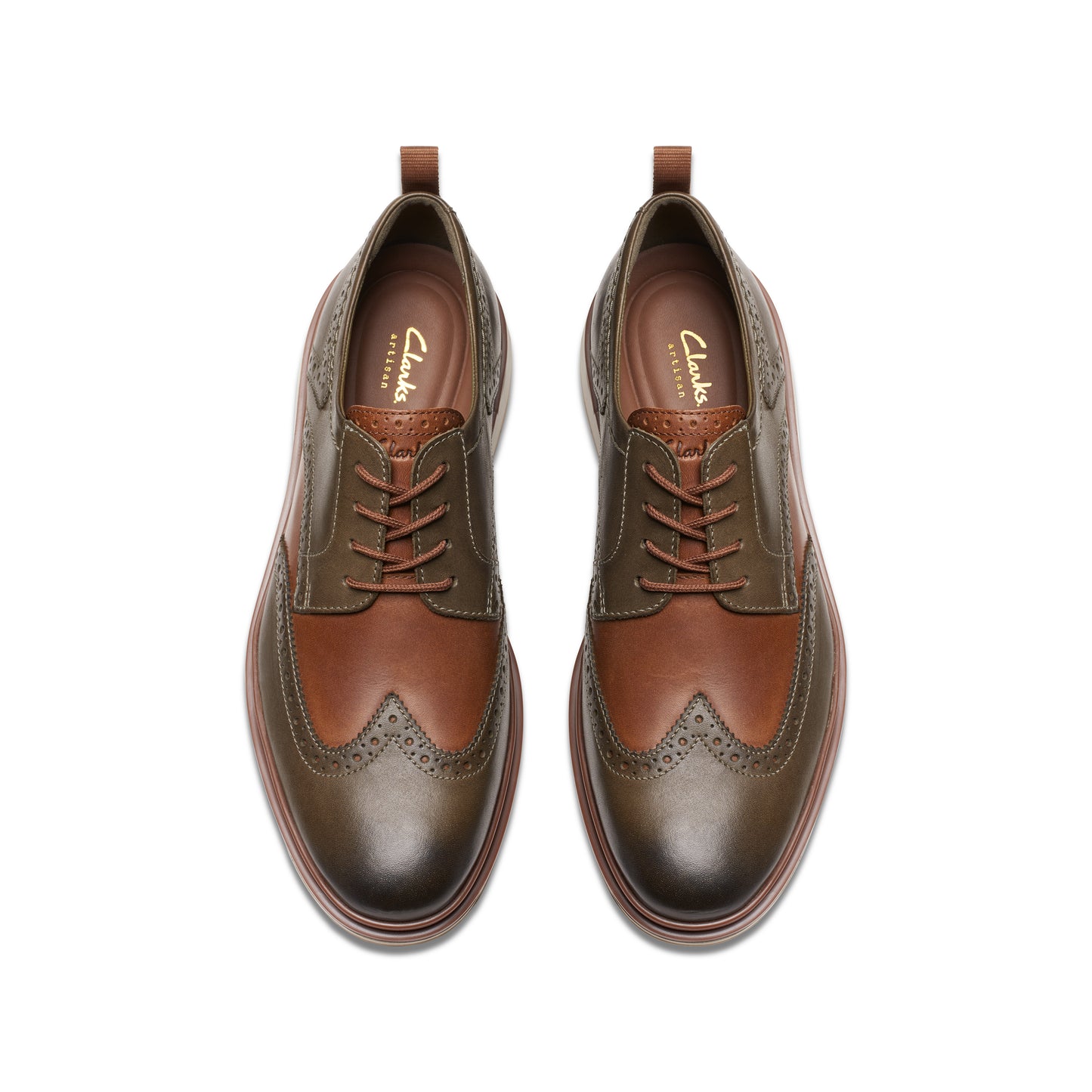 Overhead shot of brown leather brogue shoes.