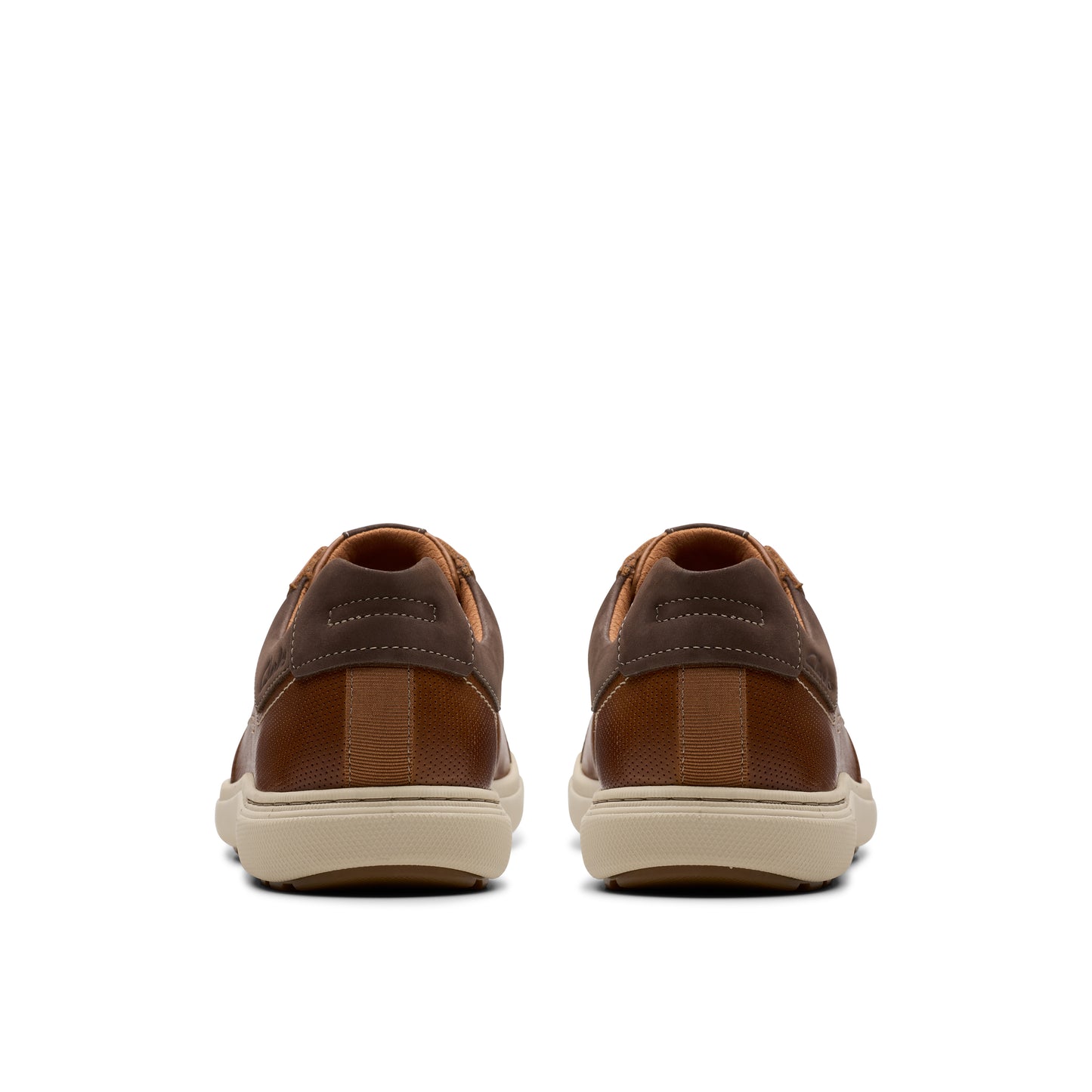 Pair of brown leather sneakers seen from behind.