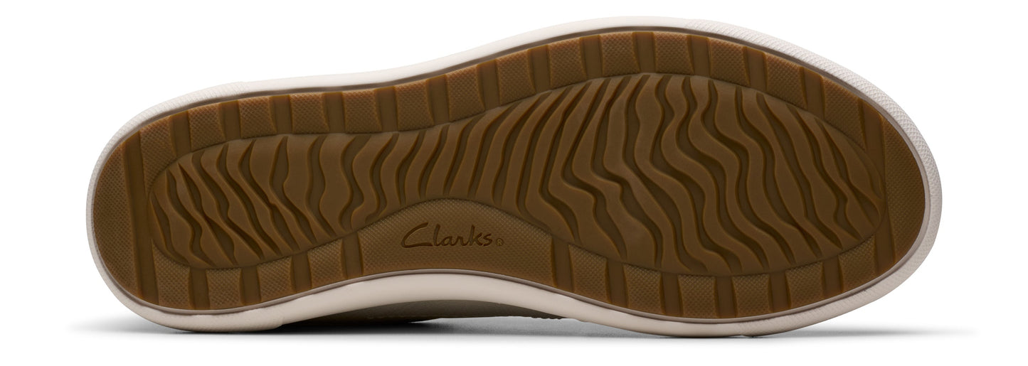 A shoe sole with brown wavy treads and the word Clarks.