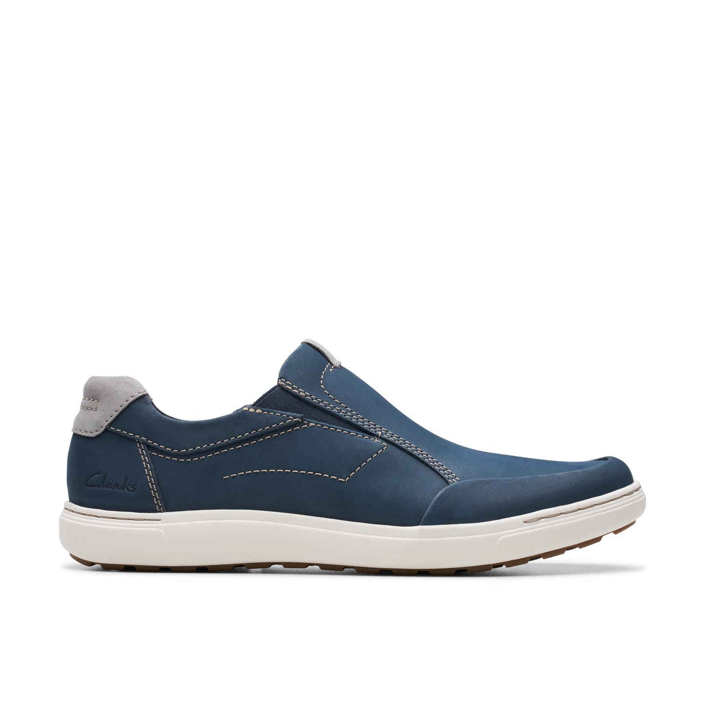 Blue slip-on shoe with grey heel and white sole.