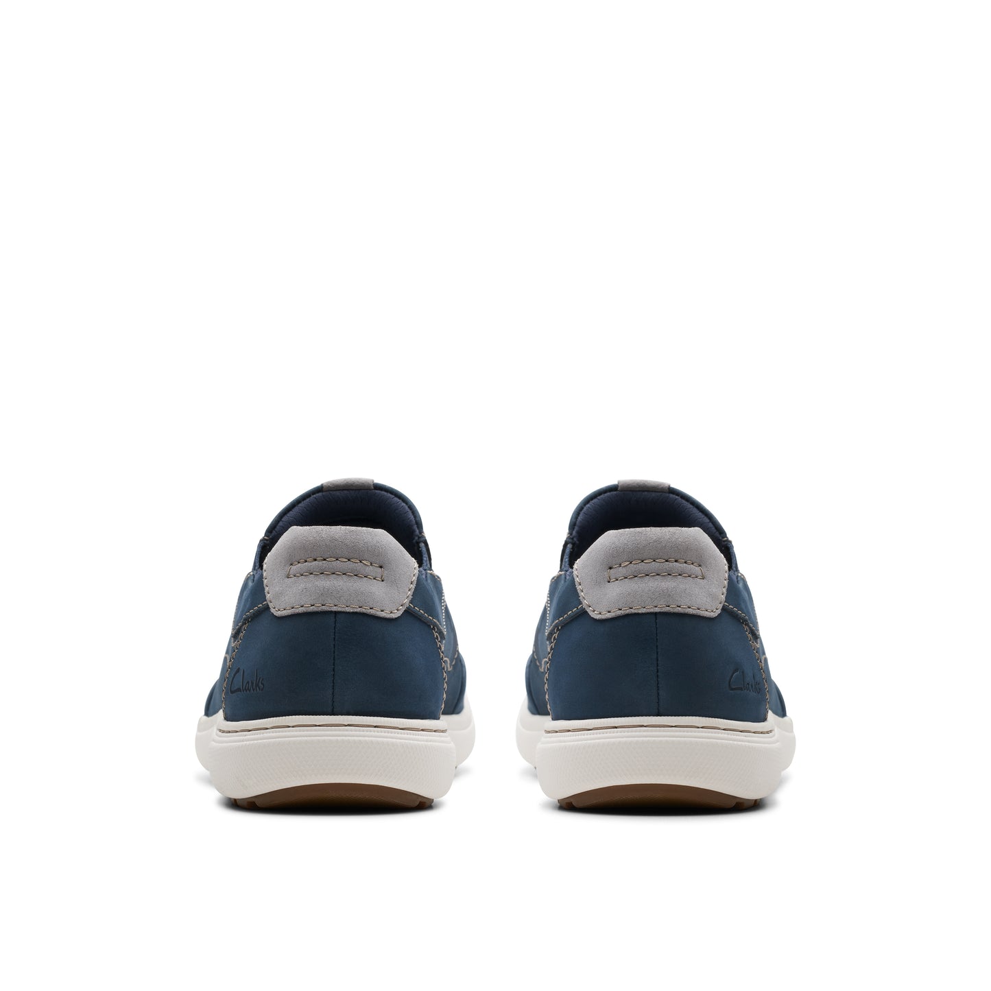 Pair of navy slip-on shoes with grey trim, back view.