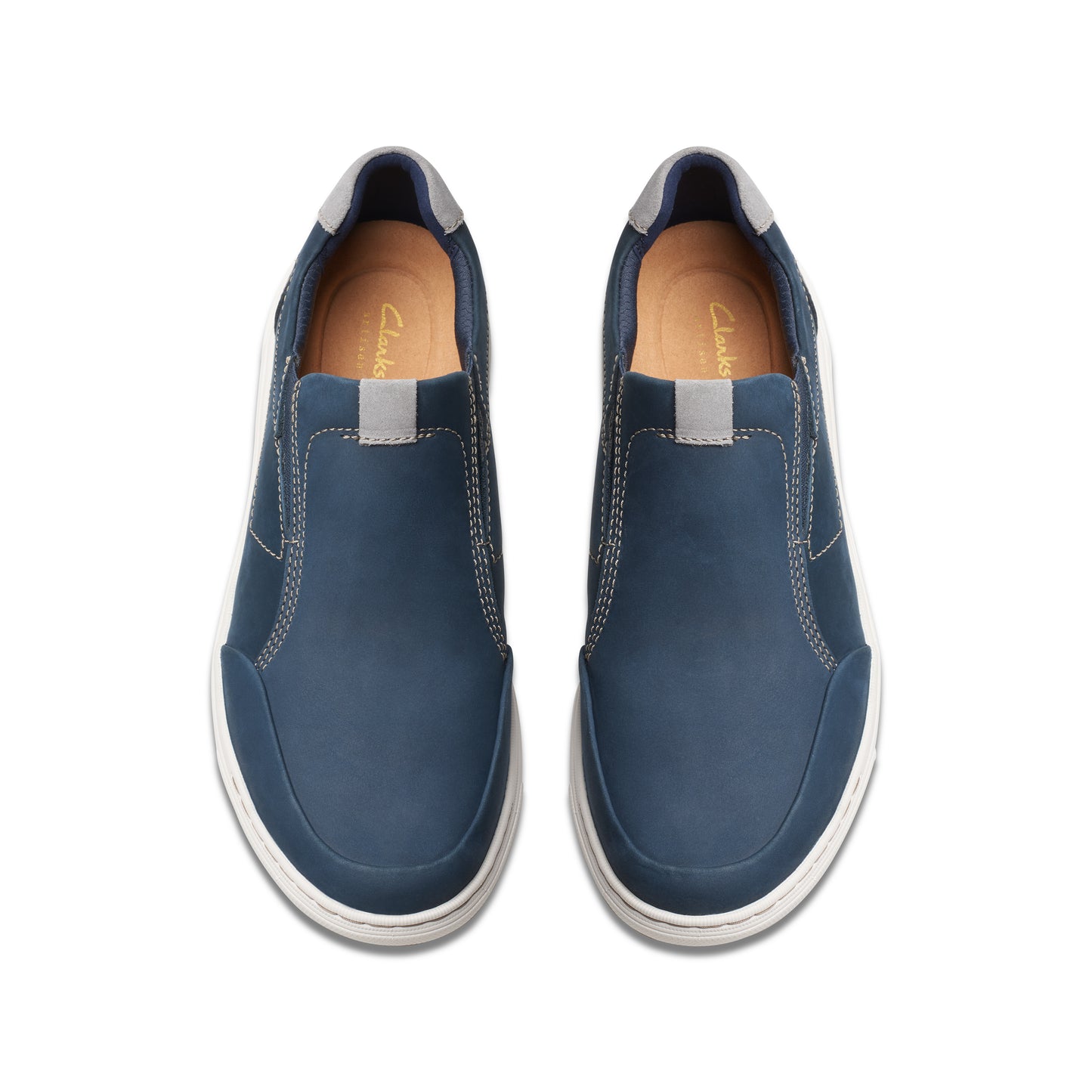 Pair of blue leather slip-on shoes with gray trim, top view.