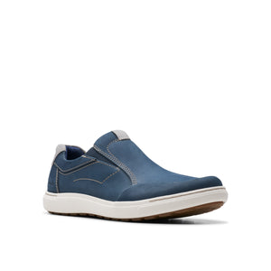 Slip-on blue nubuck shoe with white sole and stitching.