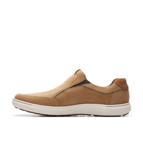Tan slip-on shoe with white sole.
