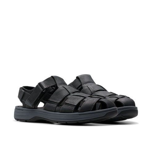 Black leather sandals with woven straps.