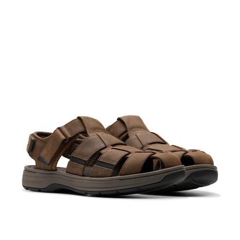 Pair of brown leather fisherman sandals with hook-and-loop closure.