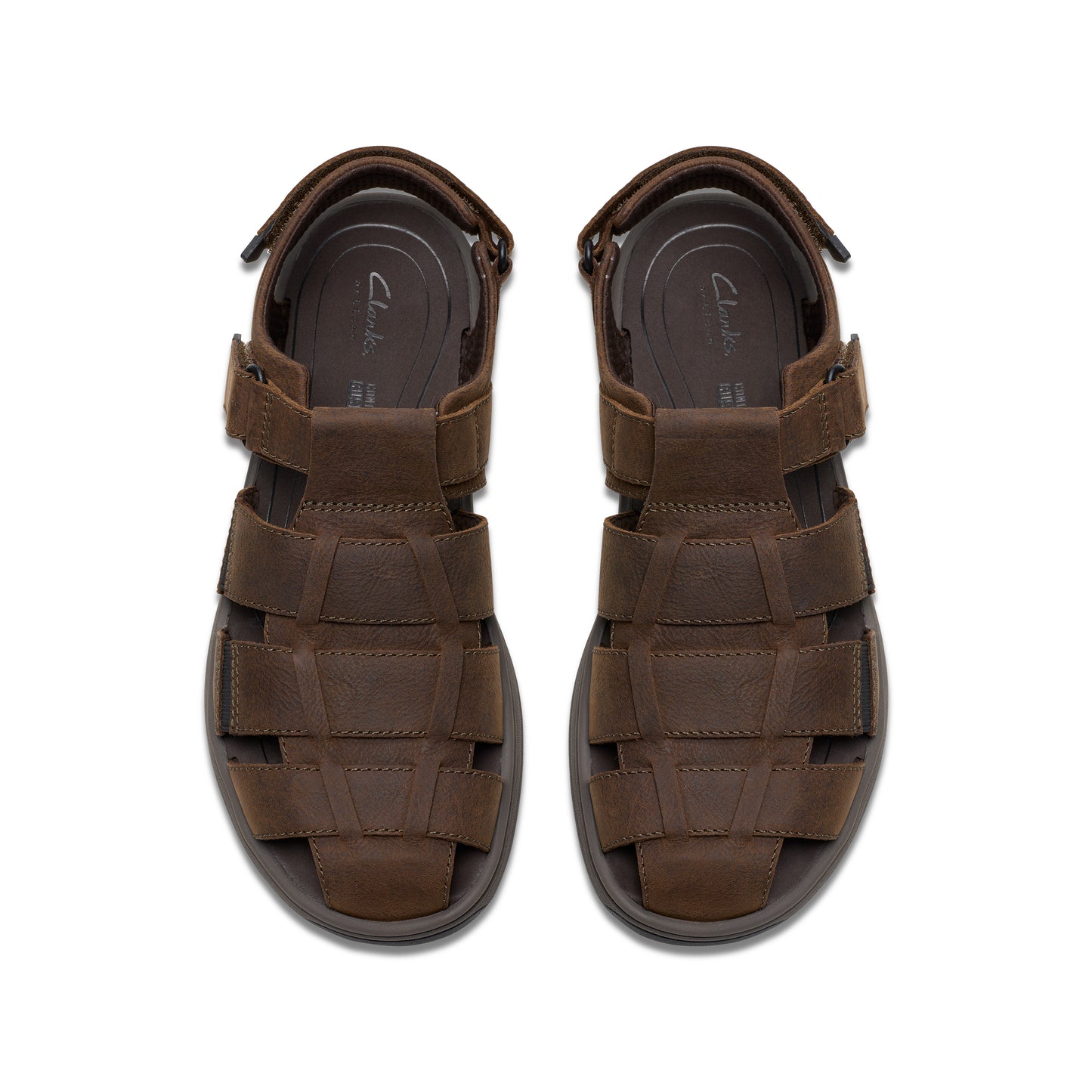 A pair of brown leather fisherman sandals, seen from above.