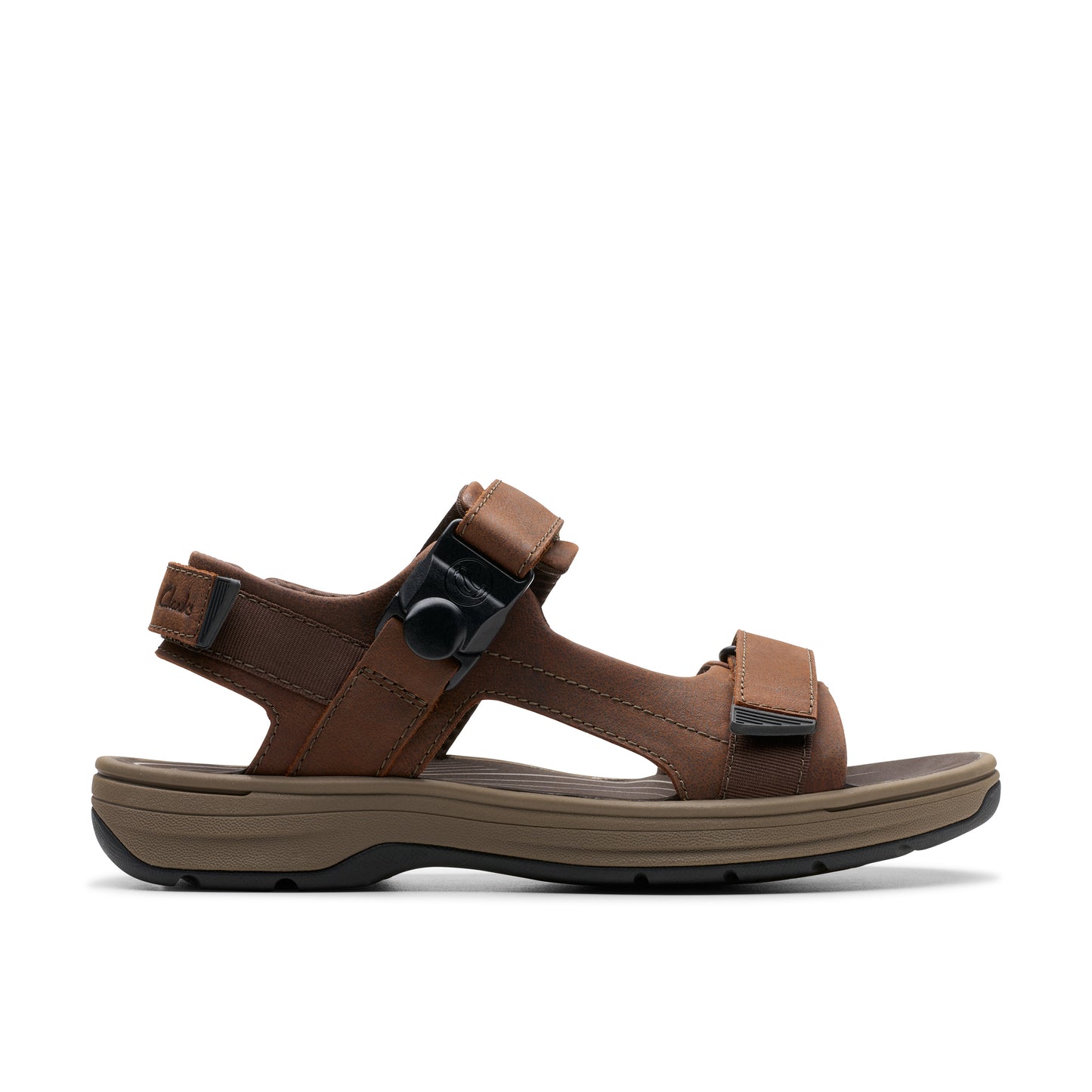Brown leather sandal with velcro straps and a black buckle.