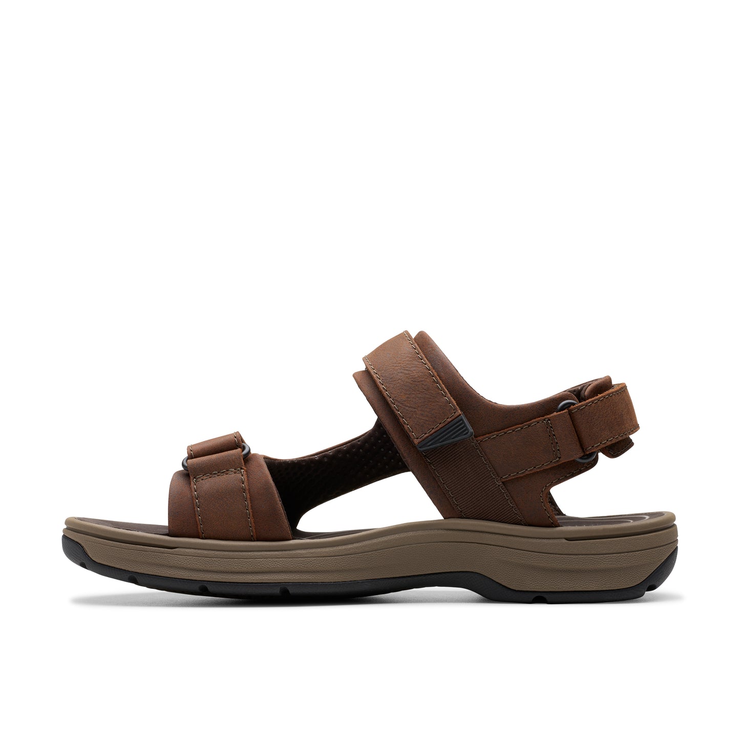 Brown sandal with hook and loop straps and dark sole.