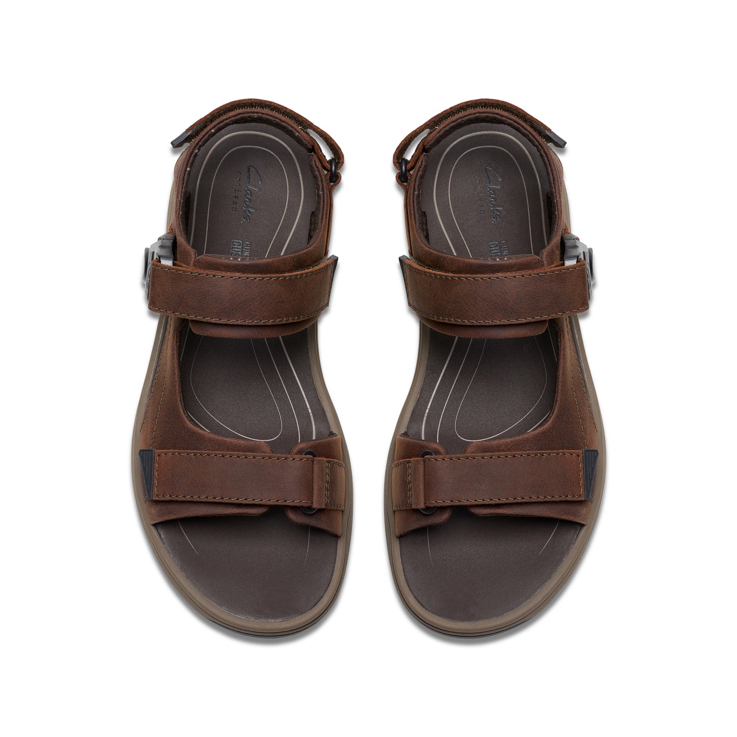 Pair of brown leather sandals with adjustable straps.