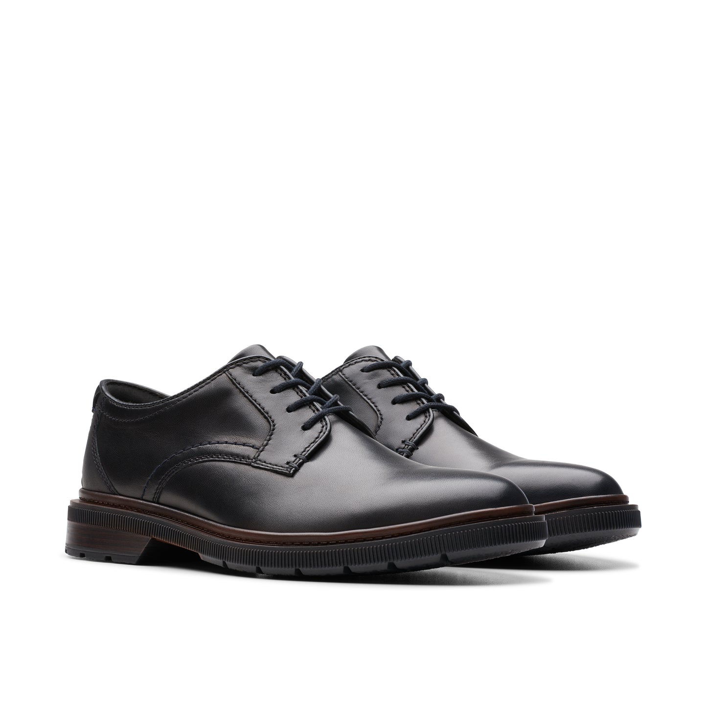 A pair of black leather dress shoes with lace-up closure.