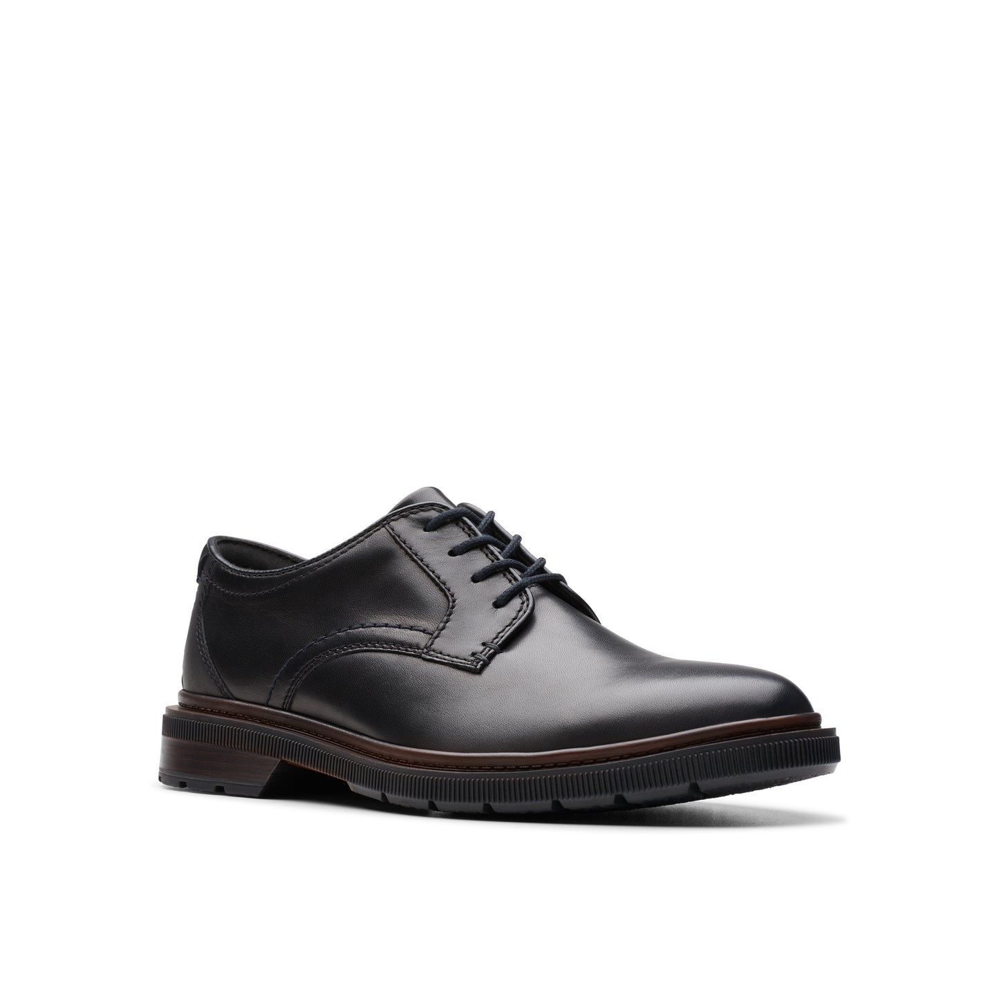 A black leather dress shoe with lace-up closure and a brown sole.