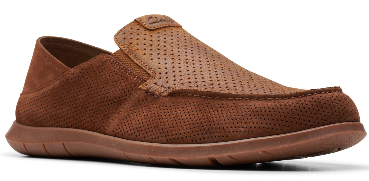 Slip-on casual shoe in brown suede with perforated upper.