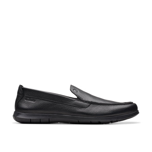 Black leather moccasin slipper with rounded toe.