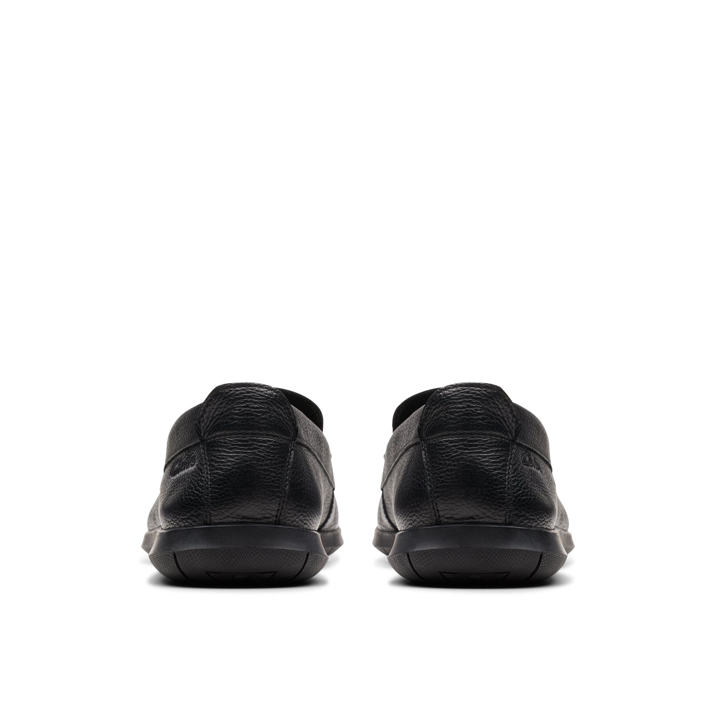 Rear view of two black leather loafers.