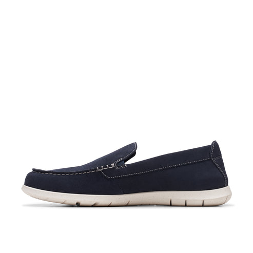 Navy blue slip-on shoe with white stitching and sole.