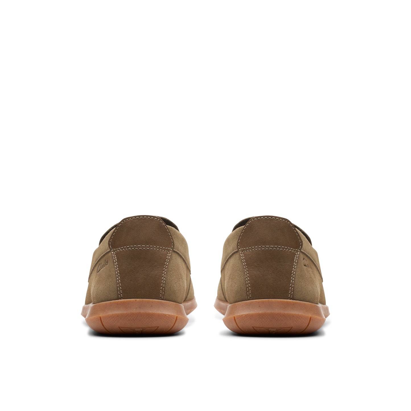 Pair of brown suede moccasins, rear view.