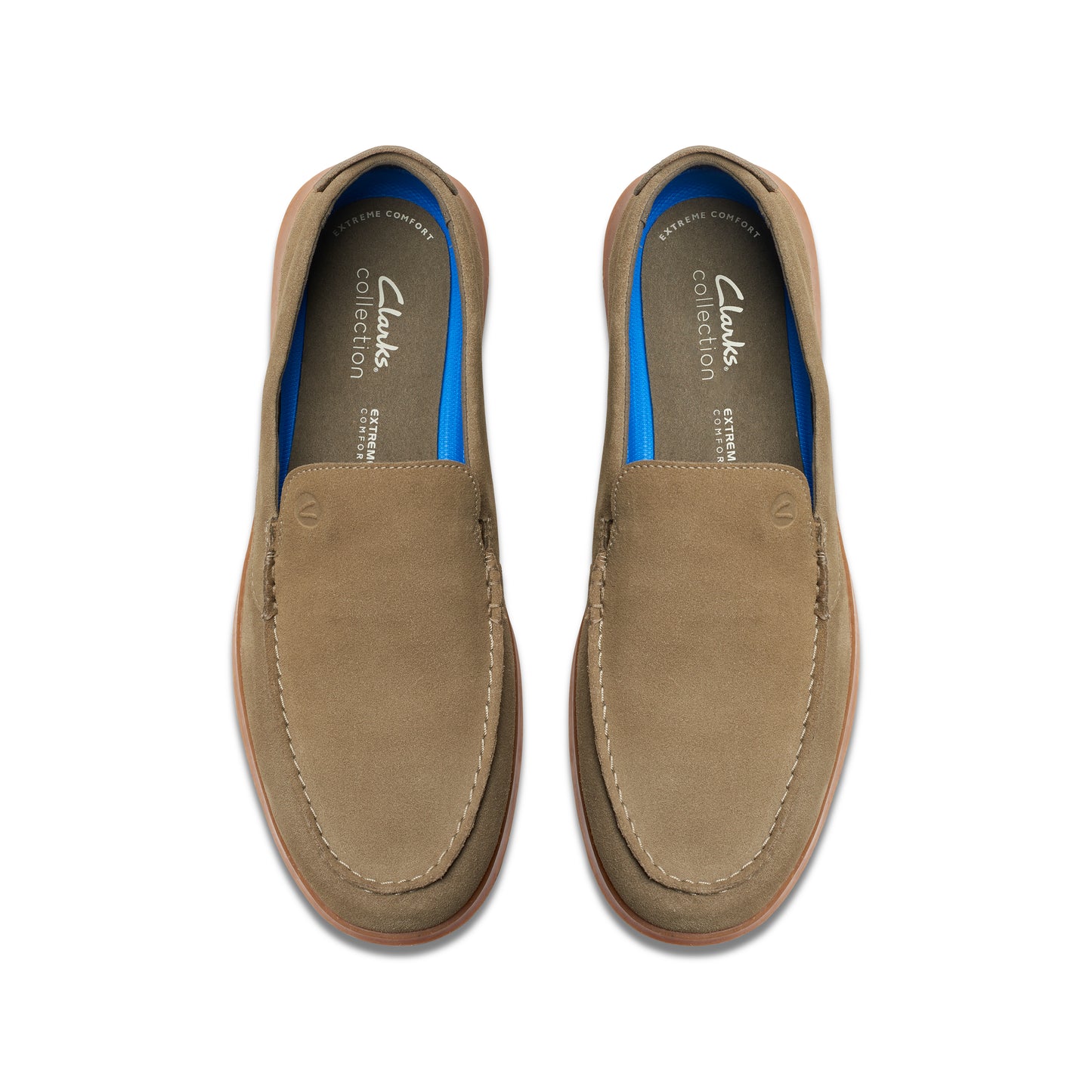 Pair of taupe-colored suede loafers with blue linings.