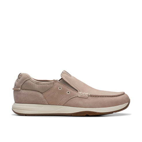 Slip-on shoe with tan leather upper, mesh heel, and white midsole.