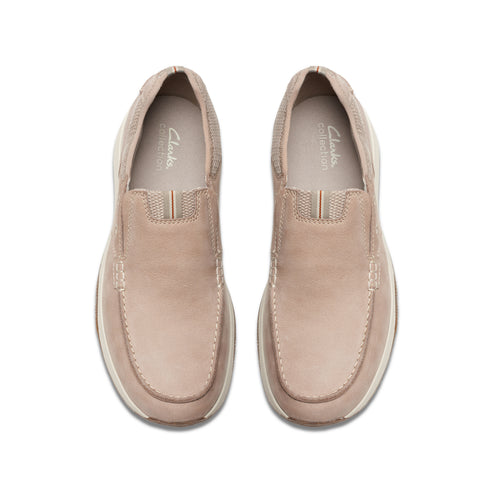 Pair of tan slip-on shoes with "Clarks Collection" text visible.