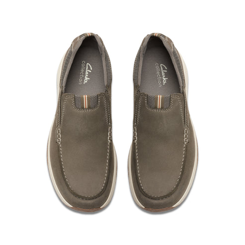 A pair of slip-on grey shoes with white soles and "Clarks Collection" text.