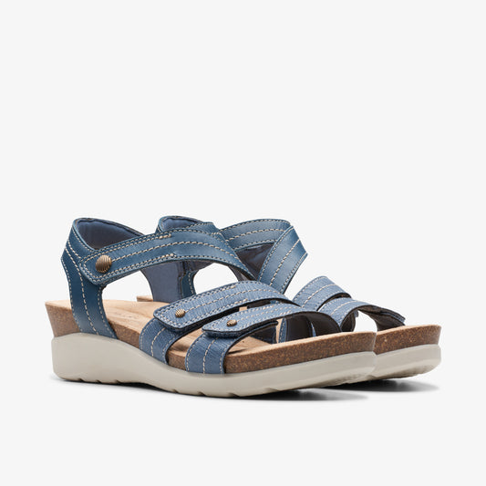 A pair of blue sandals with adjustable straps and a cork sole.