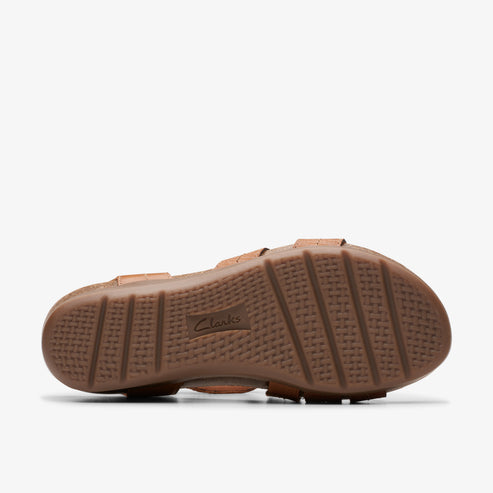 Sandal sole with treads and "Clarks" logo.