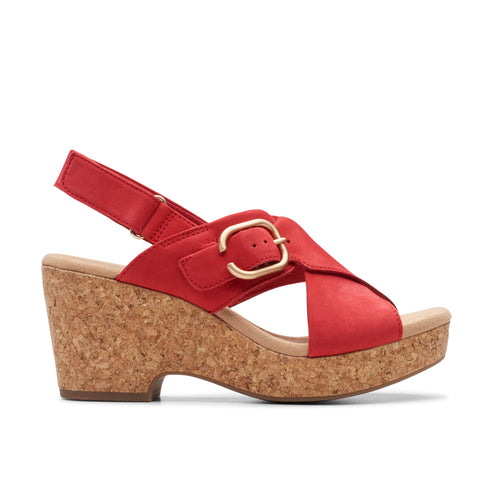 Red wedge sandal with a gold buckle.