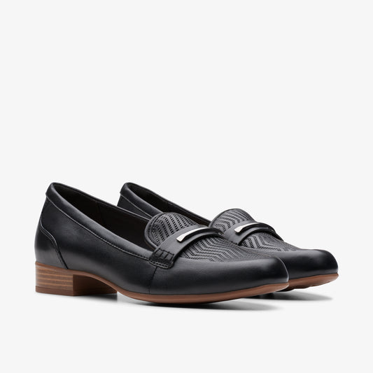 A pair of black leather loafers with a small heel and silver buckle embellishment.