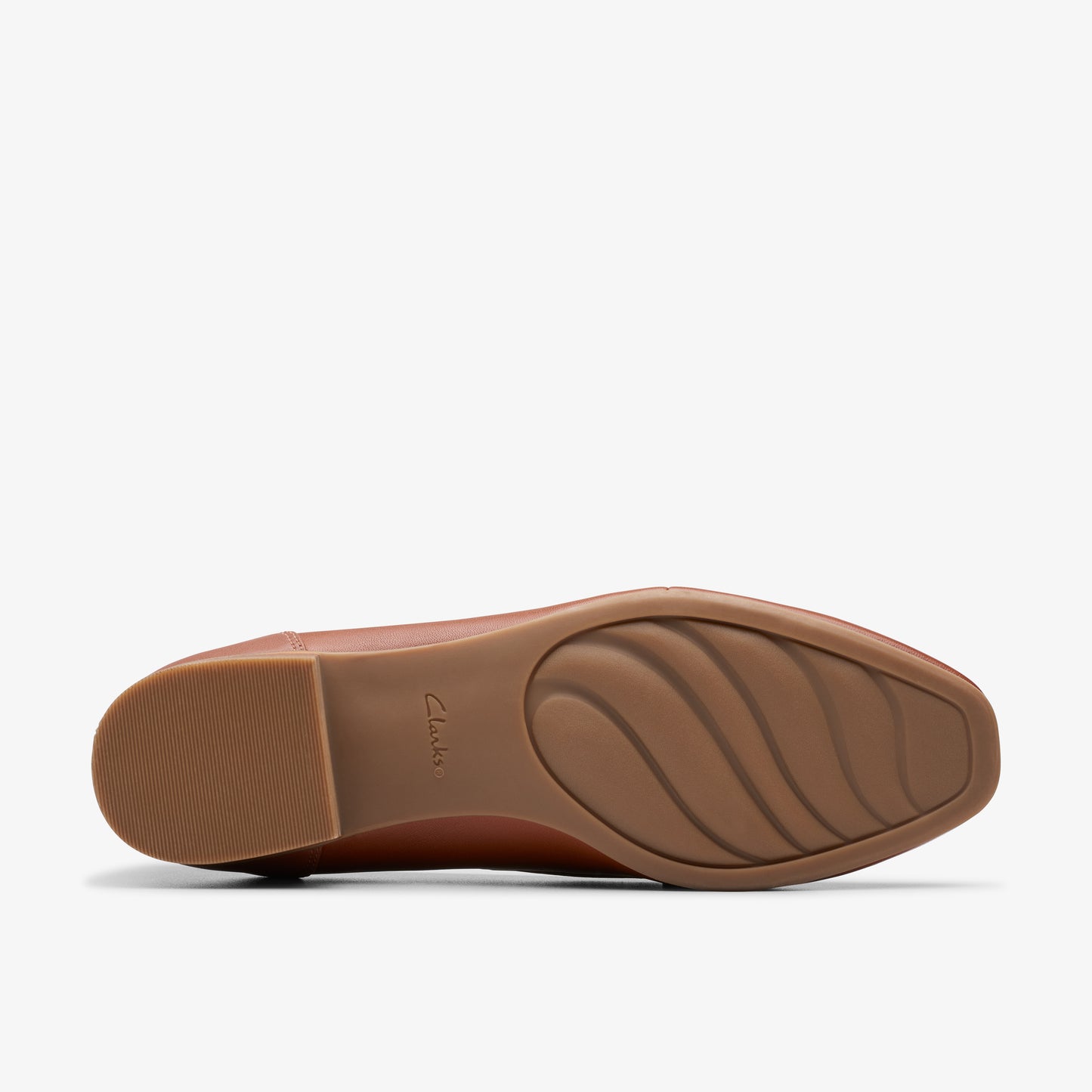 Brown shoe sole with wave pattern.