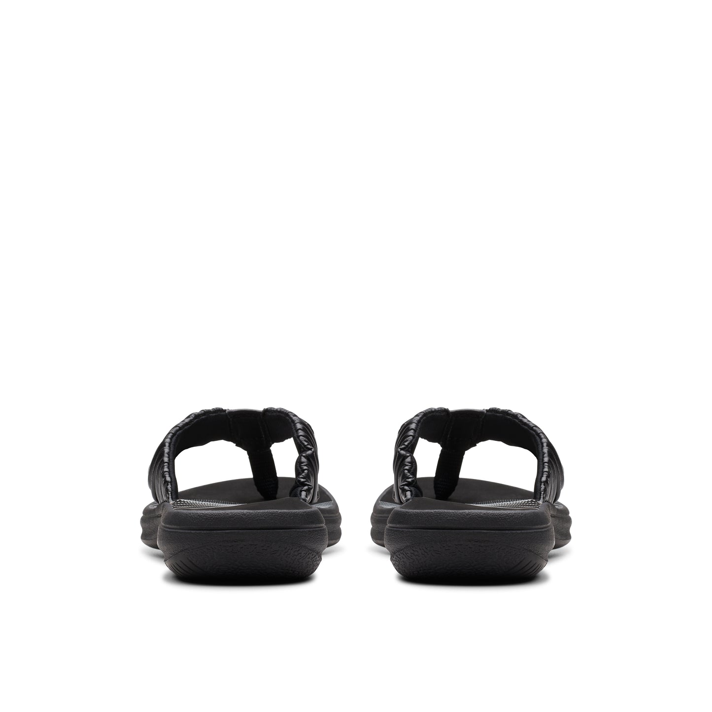 Pair of black toe-post sandals with woven straps.