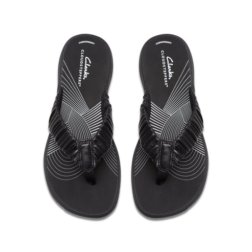 Pair of black flip-flops with gathered straps and 'CLOUSTEPPERS' text on the insole.