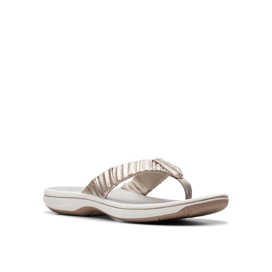 Gold, thong-style sandal.