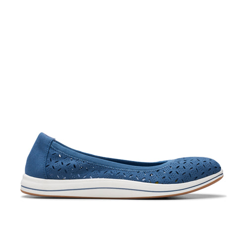 Blue flat shoe with laser cut design and white sole.