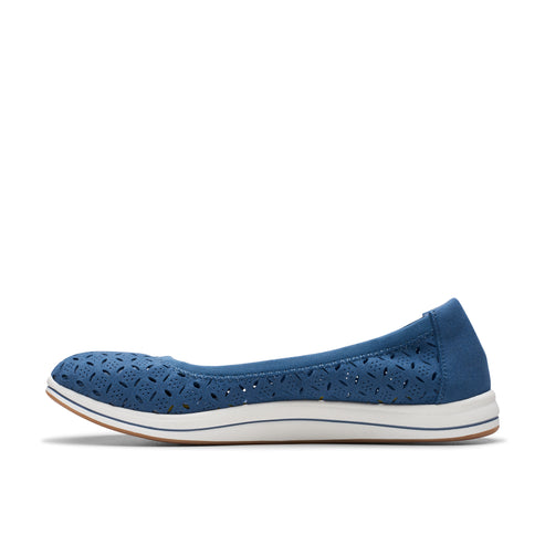 A blue ballet flat shoe with decorative laser cutouts and a white sole.