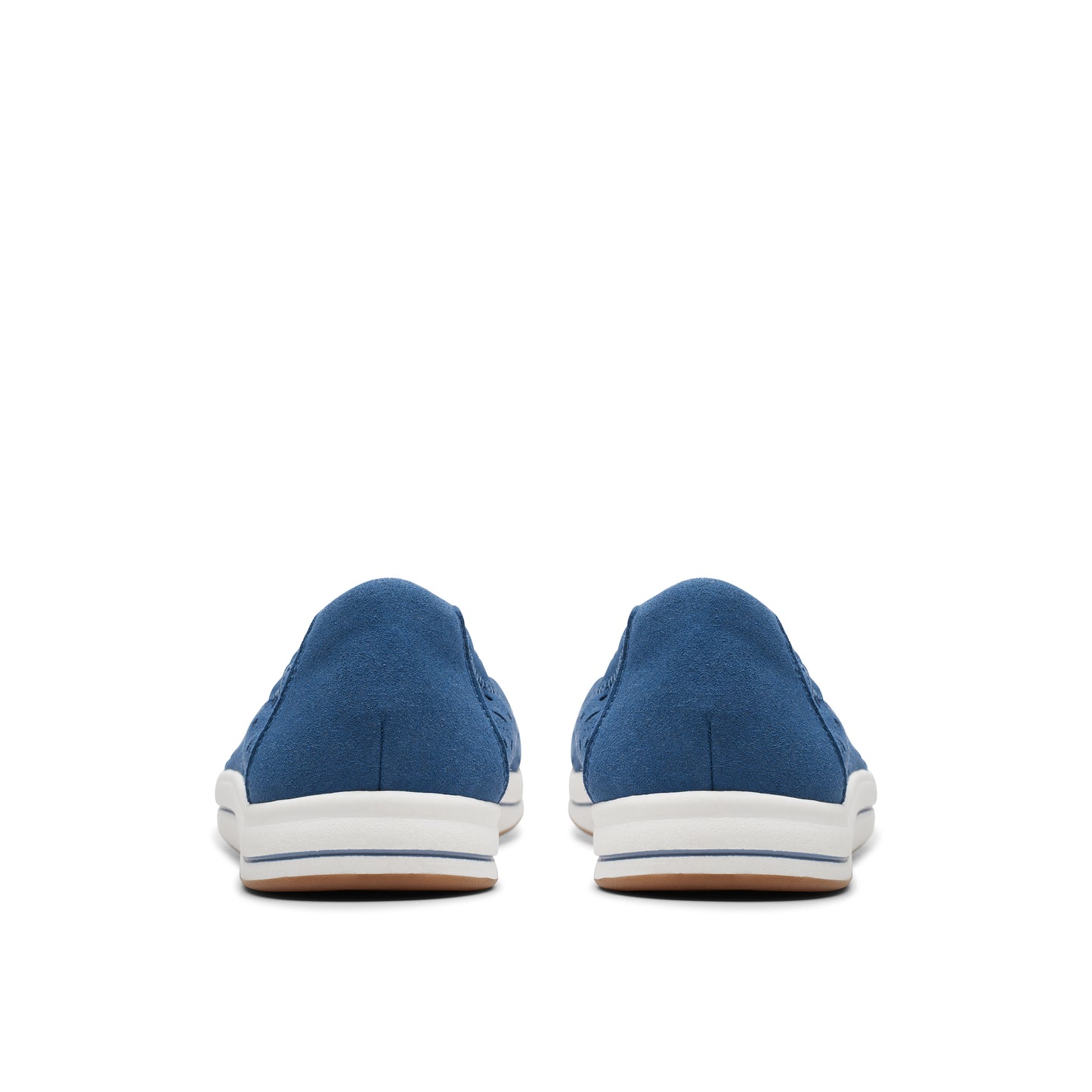 View of the back of a pair of blue slip-on shoes with white soles.
