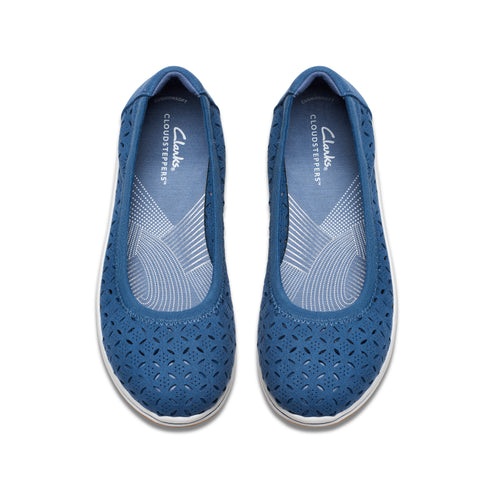 Pair of blue flats with geometric cutouts and 'Cloudsteppers' branding on the insole.