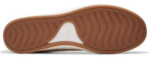 A shoe's brown rubber sole.
