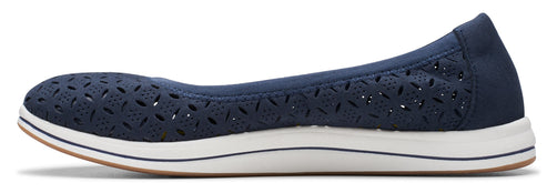 A navy blue perforated flat shoe with a white sole.