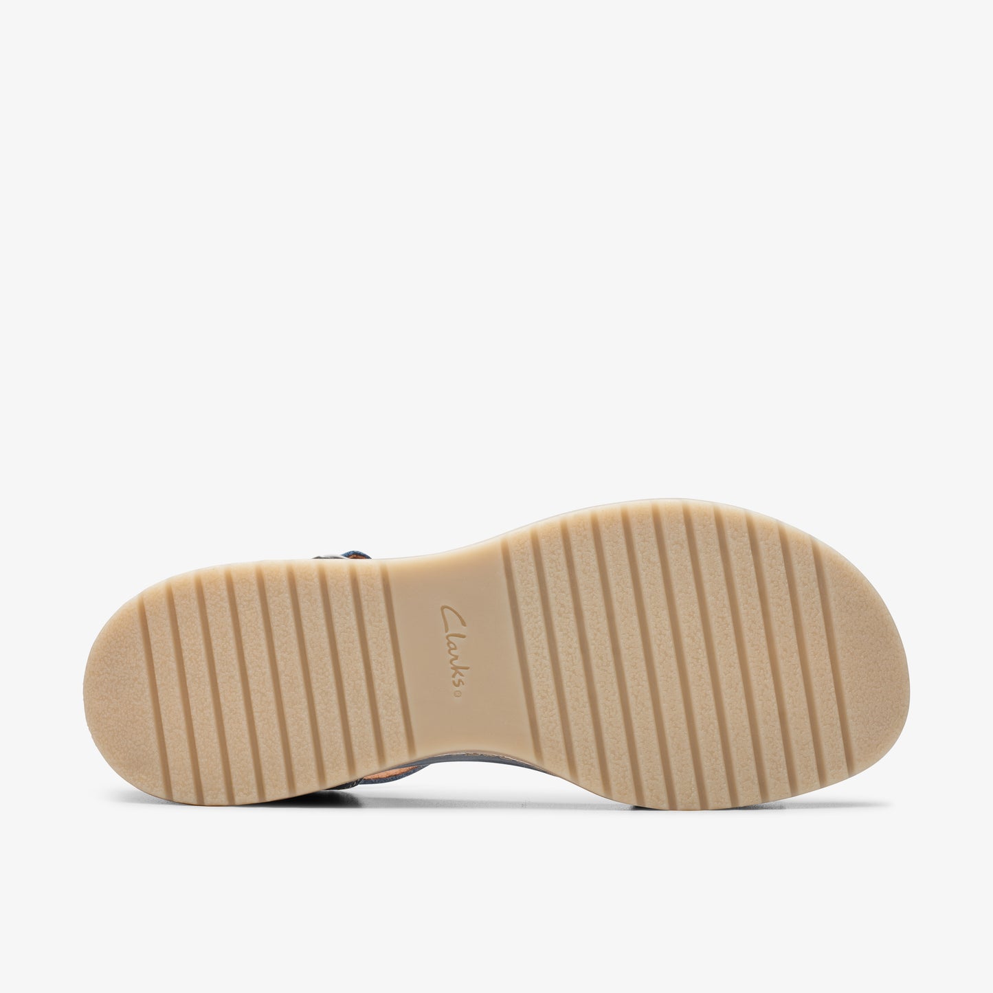 Sandal with a tan ridged sole.