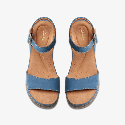 Pair of blue leather sandals with ankle strap, viewed from above.