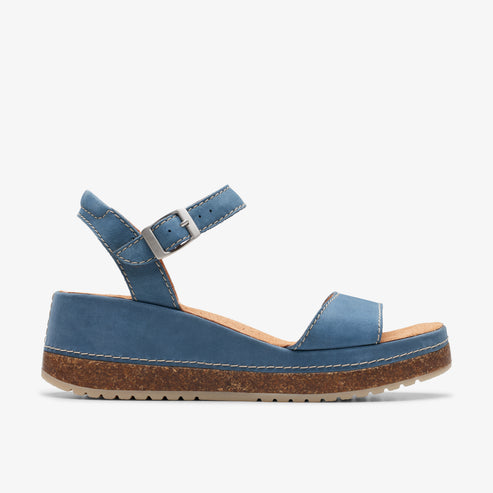 Blue wedge sandal with cork platform and ankle strap.