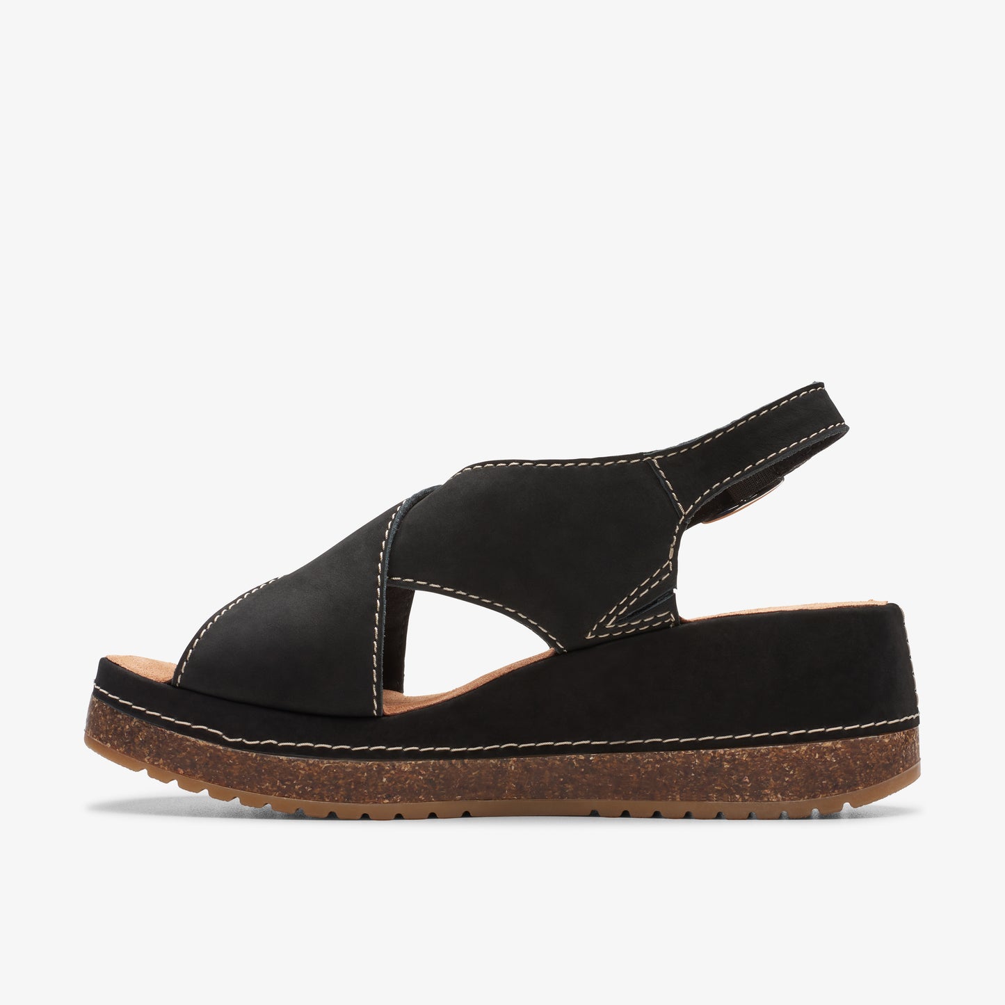 Black platform sandal with criss-cross straps and cork sole.