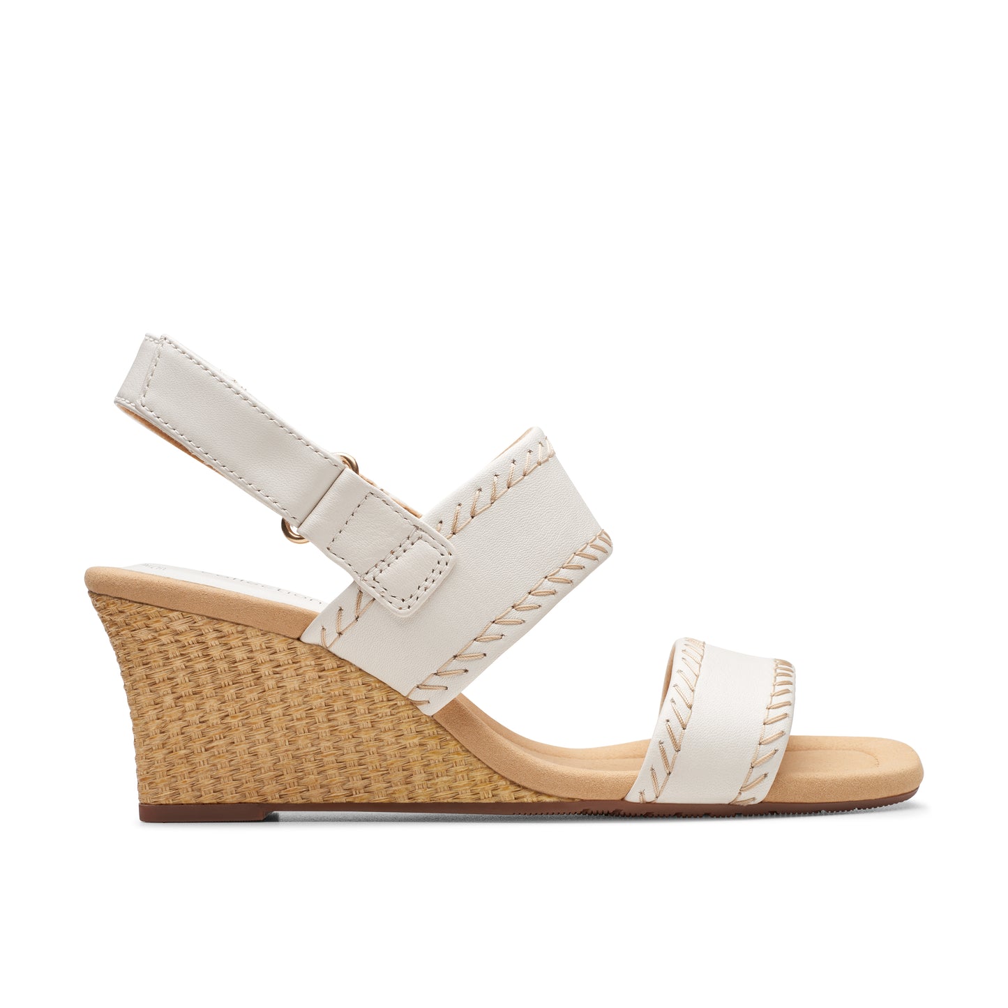 White wedge sandal with ankle strap.