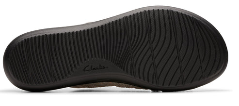 Close-up of the sole of a shoe, showing the black ribbed texture and the word 'Clarks' printed into it.