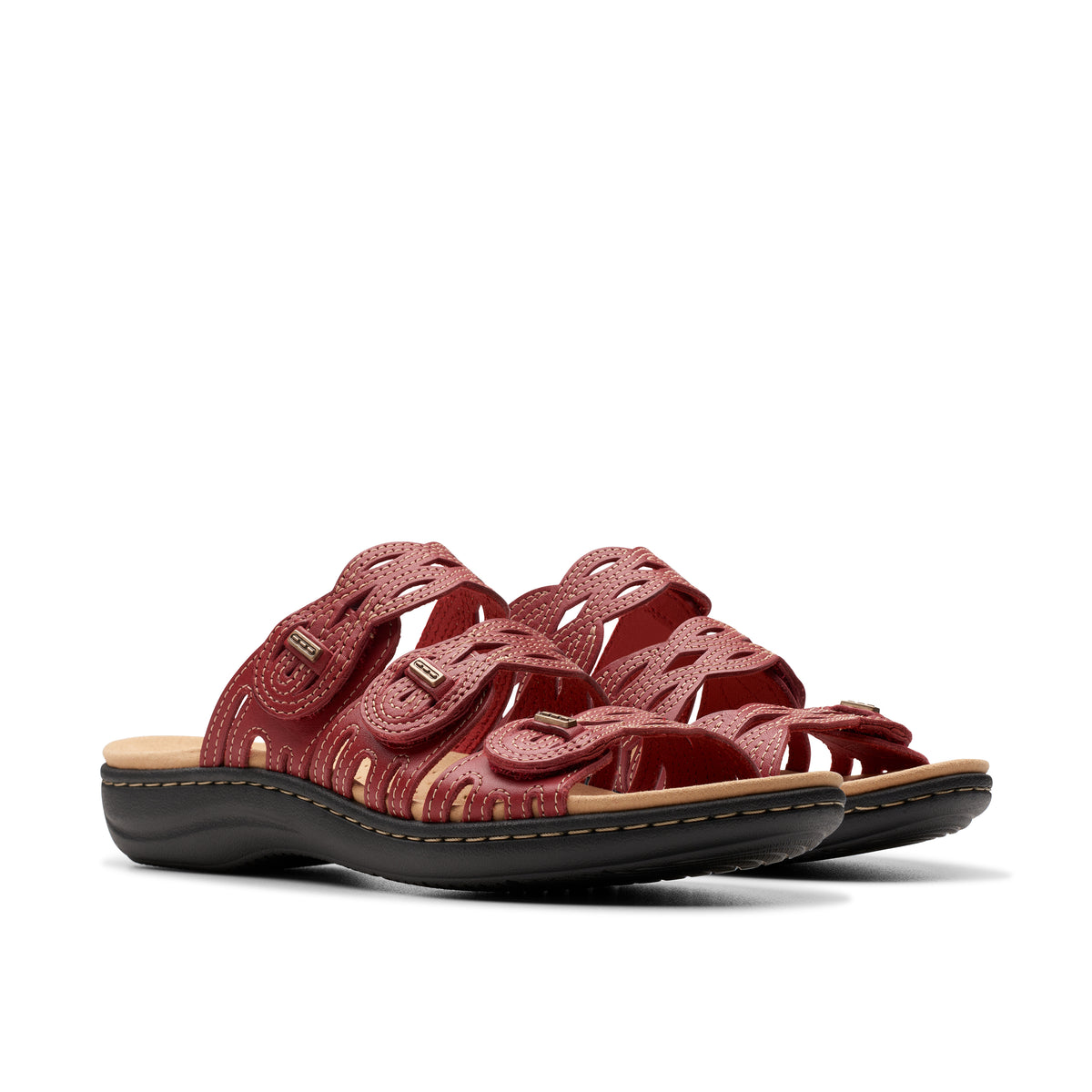 Pair of red leather sandals with woven strap details.