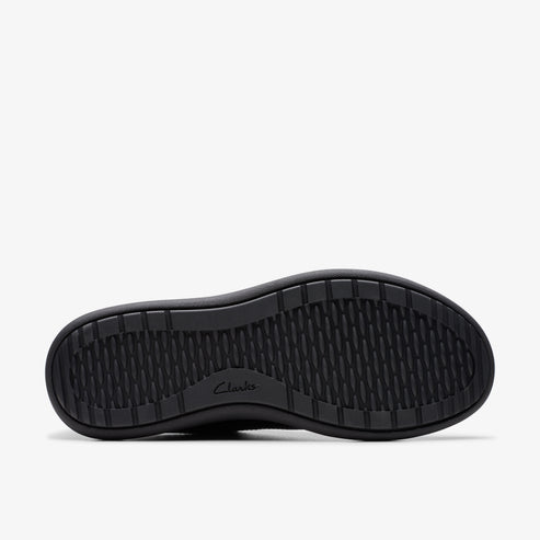 Black shoe sole with geometric tread pattern and 'Clarks' text.