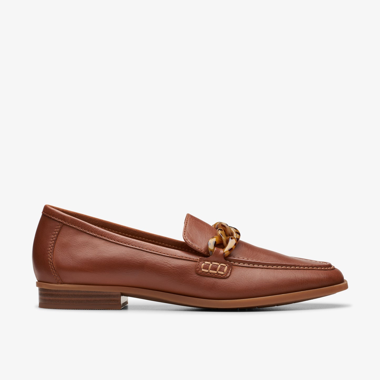 Brown leather penny loafer with a gold chain.